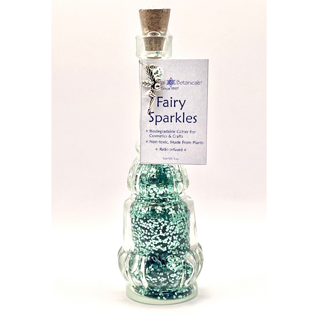 Bottle of 'Fairy Sparkles' with a label on a white background