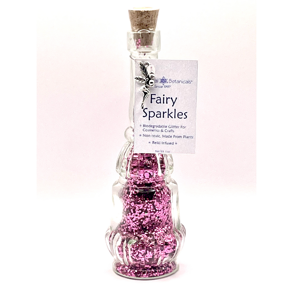 Bottle of 'Fairy Sparkles' with a label on a white background