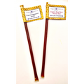 Two honey sticks with labels on a white background