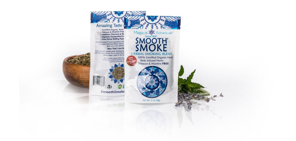 Two packages of 'Smooth Herbal Blend' tea on a white background with a wooden bowl and green leaves.